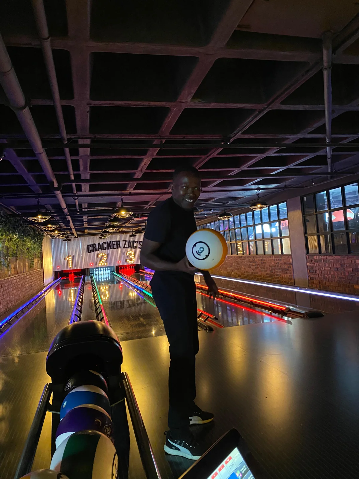 Gauteng team member holding a bowling ball