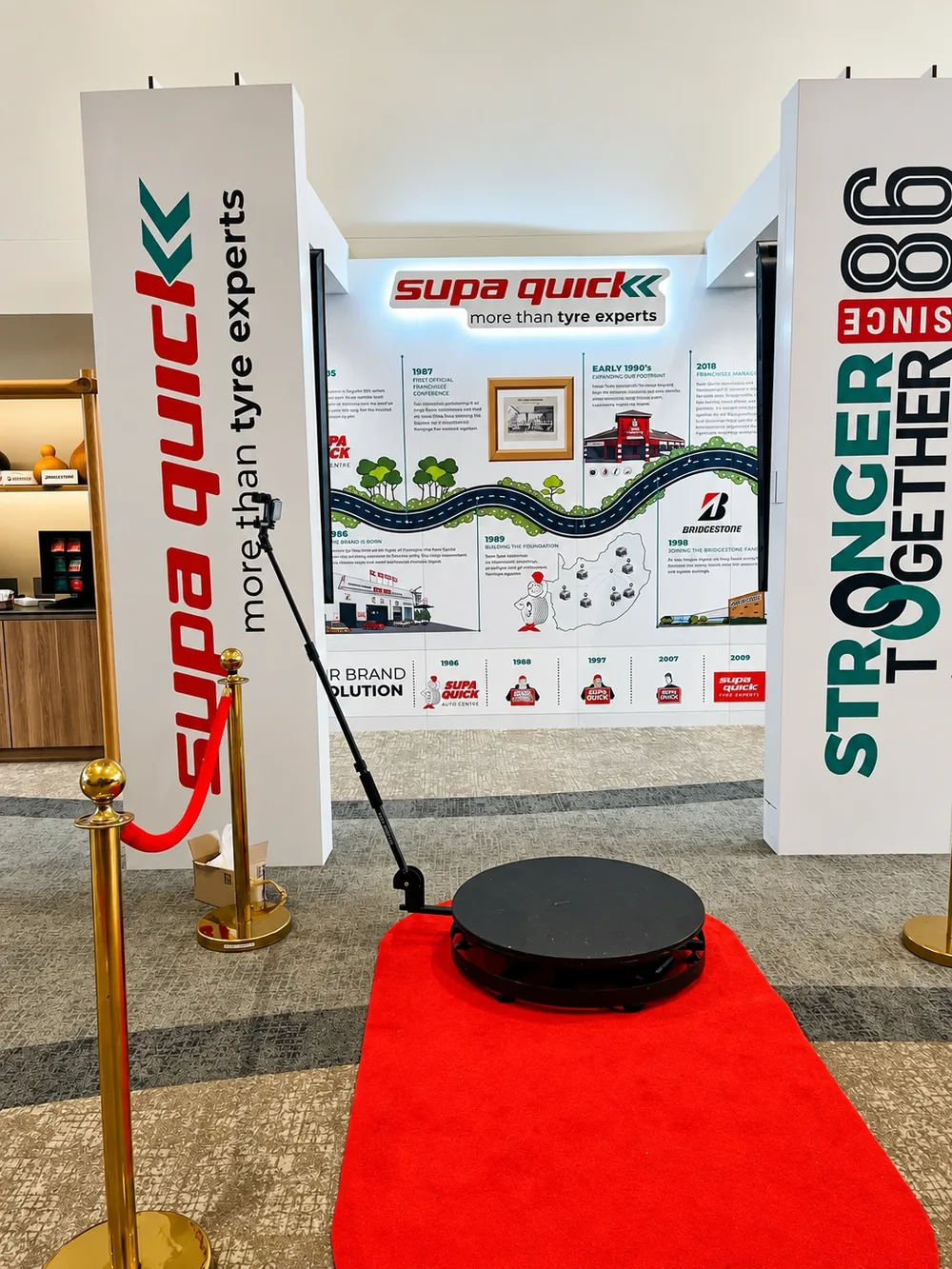 Completed 360 platform with red carpet, barriers and branded backdrop