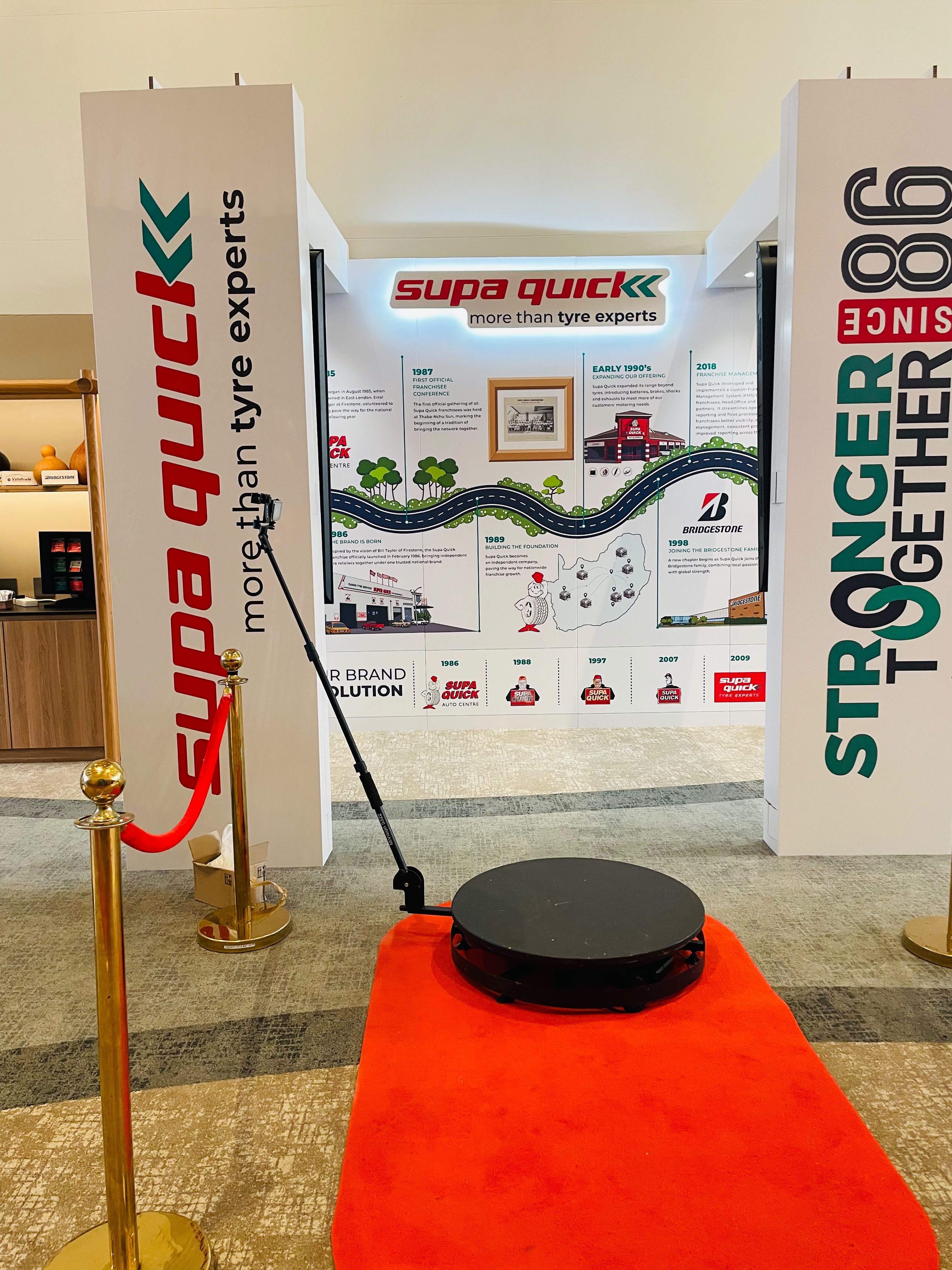 Completed 360 platform with red carpet, barriers and branded backdrop