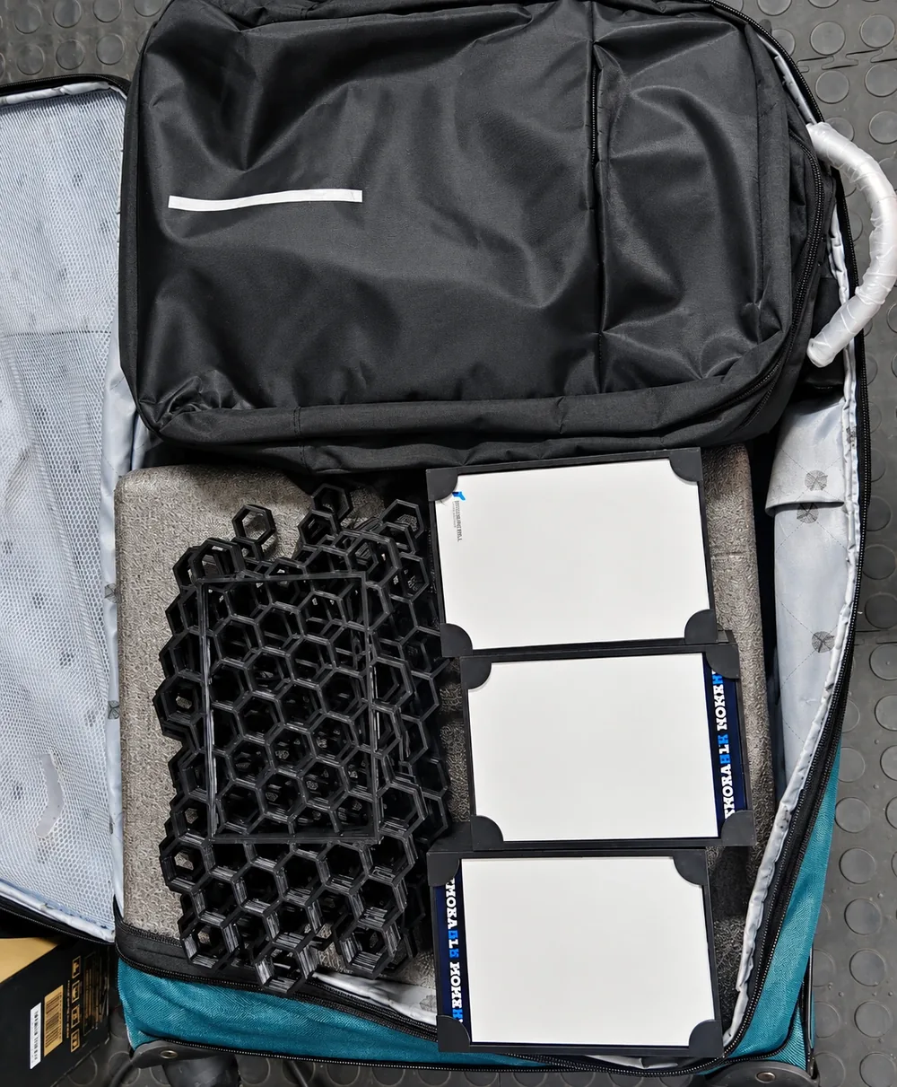 Accessories arranged inside a padded equipment bag