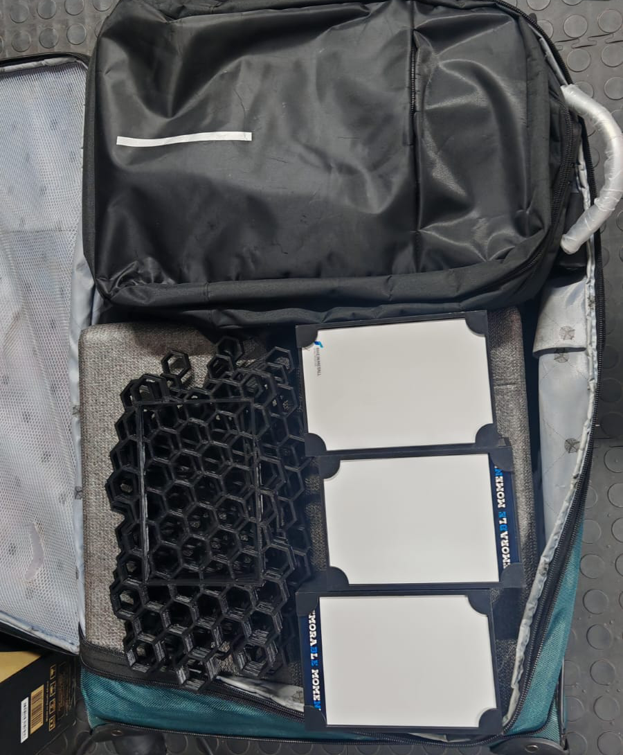 Accessories arranged inside a padded equipment bag