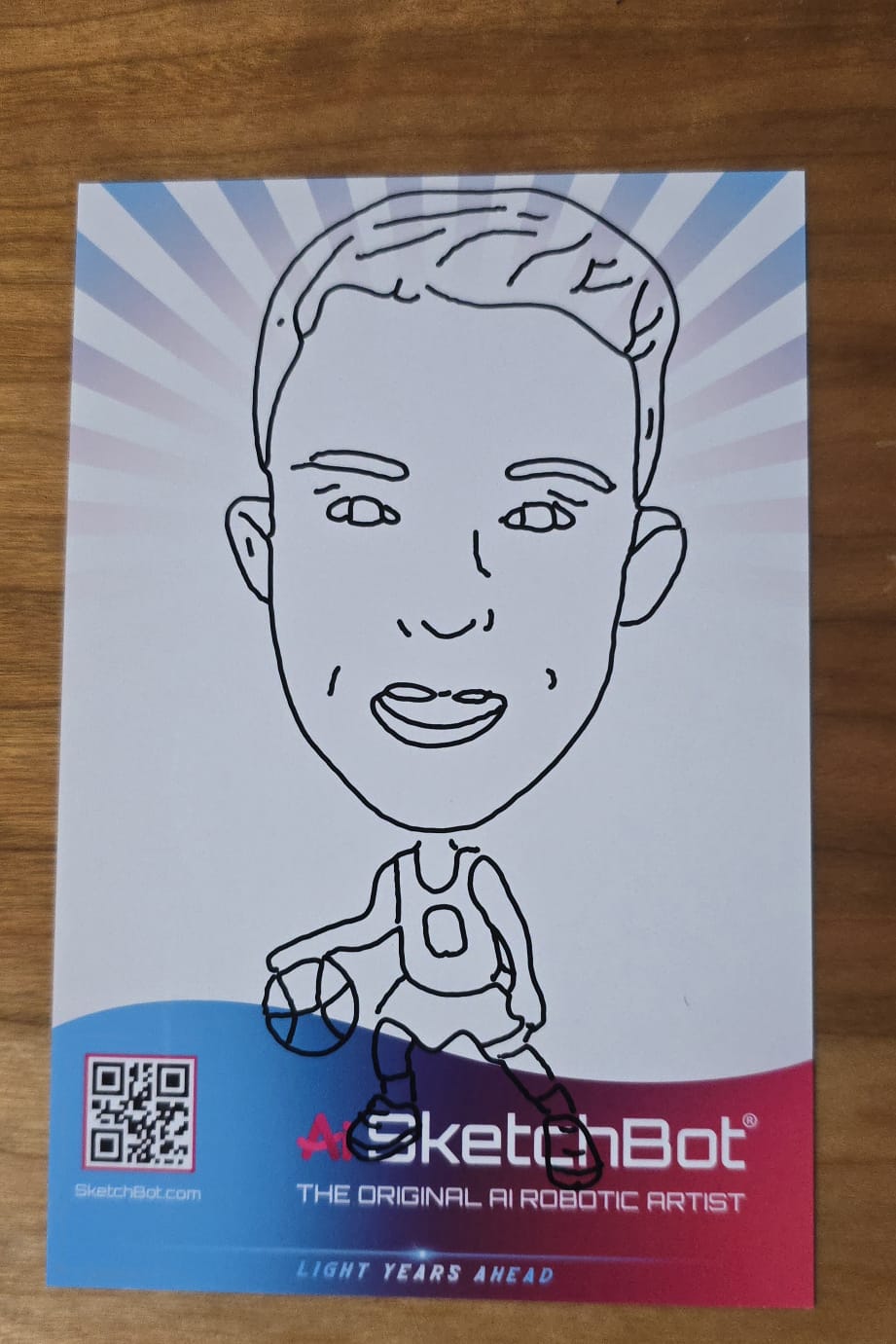 A finished SketchBot portrait on printed paper, ready to take home