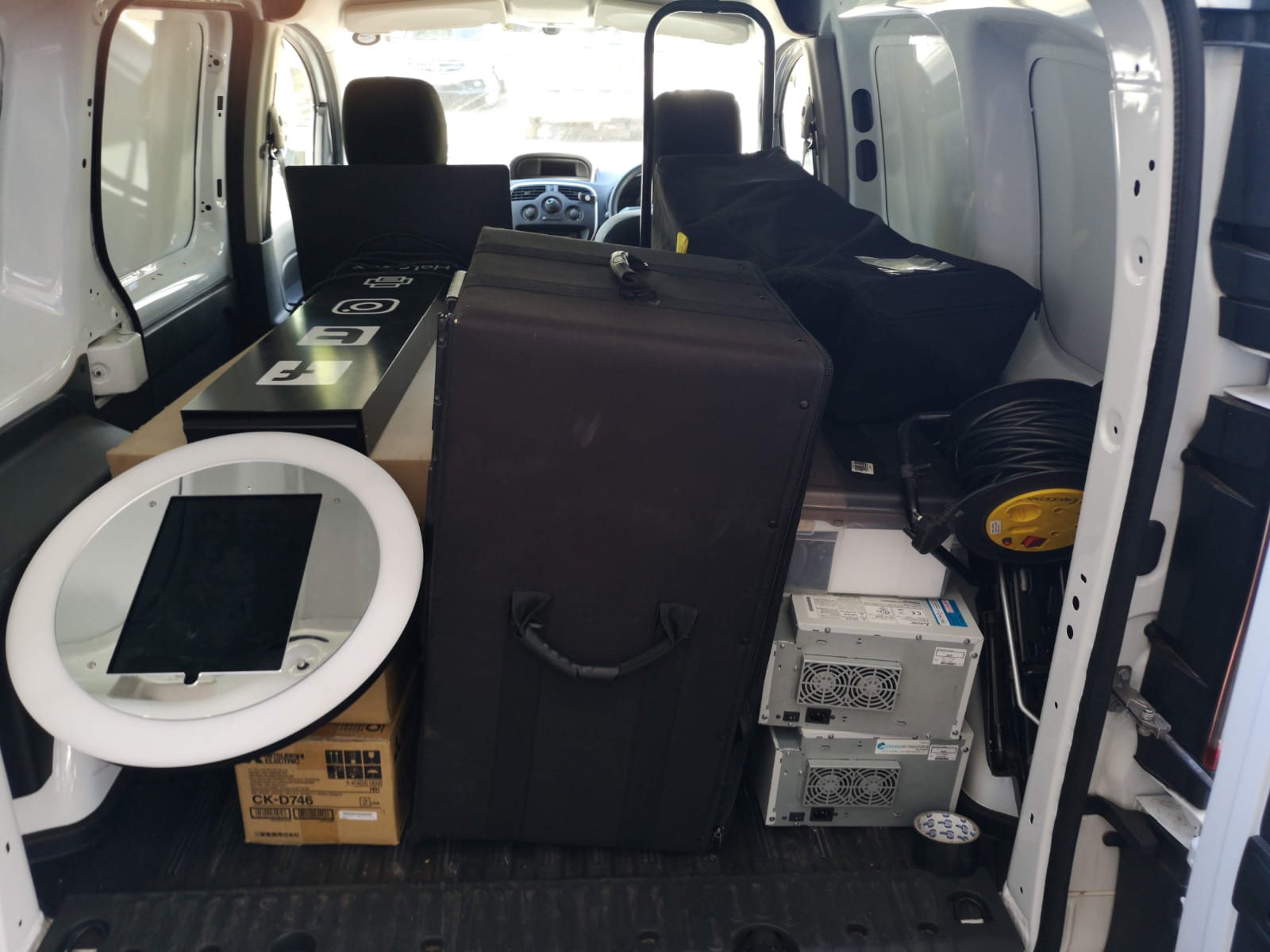 HaloBox and equipment cases loaded inside the van