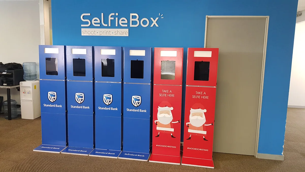 Rows of fully branded Standard Bank and Woolworths Shift booths