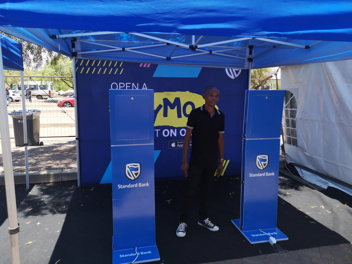 Branded photo booth installation at an outdoor event venue
