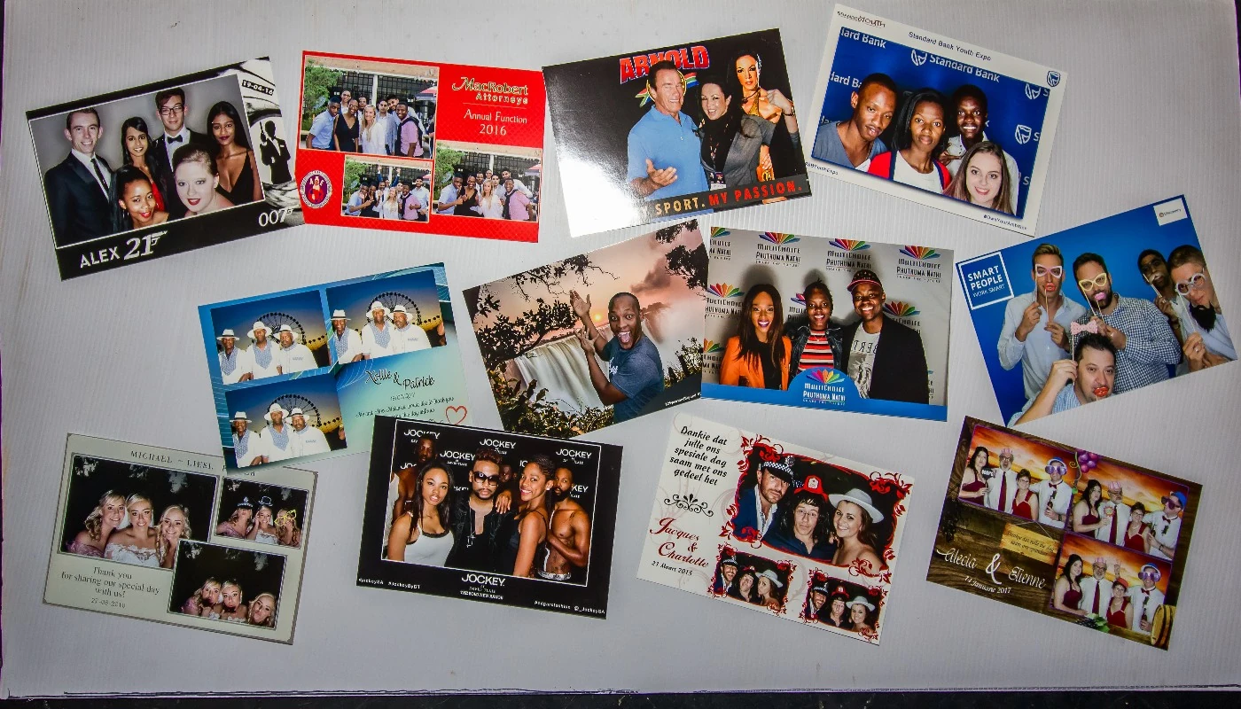 A selection of finished branded photo booth prints in different sizes and layouts