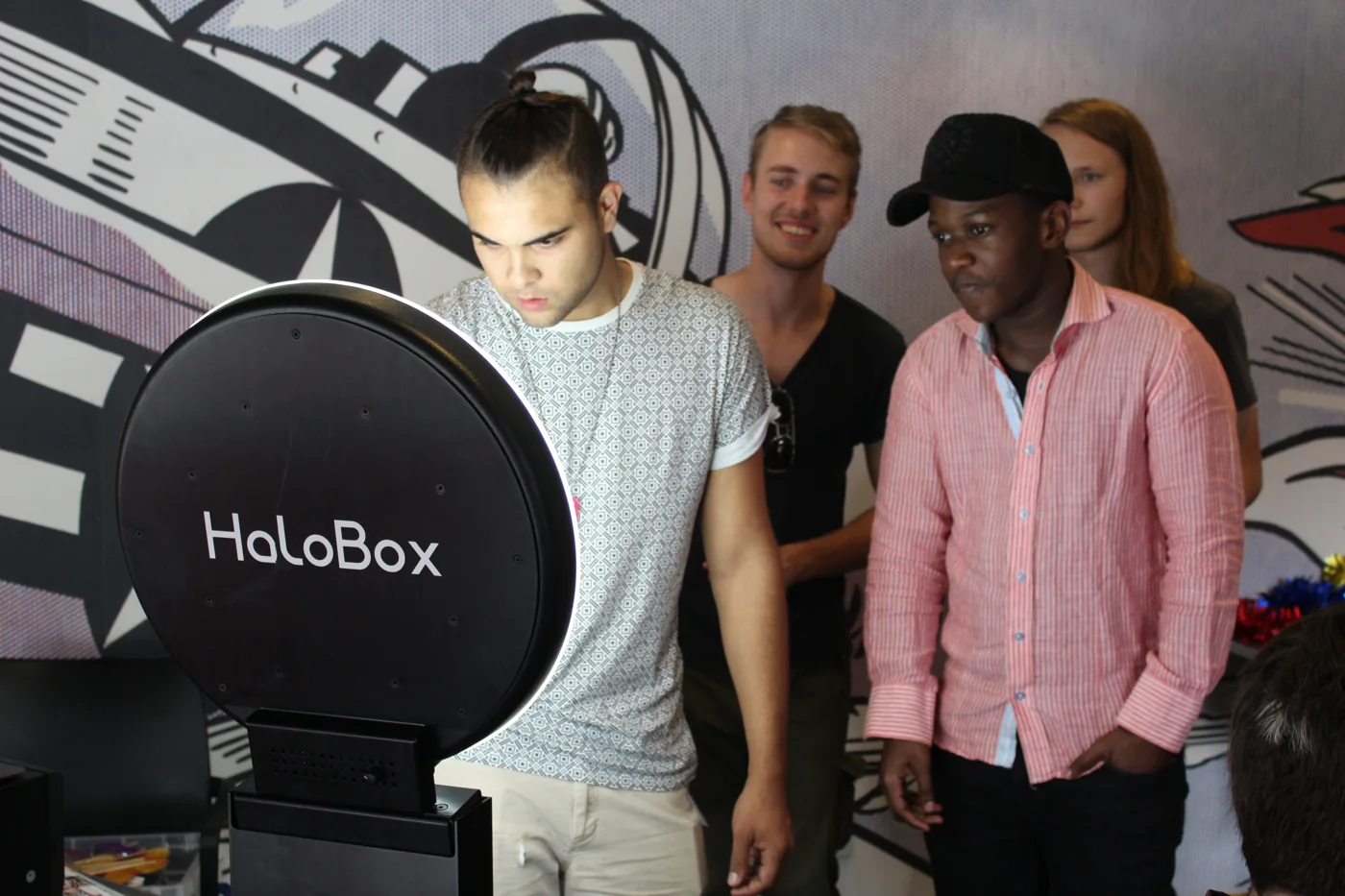 Guests using a HaloBox photo booth at an event
