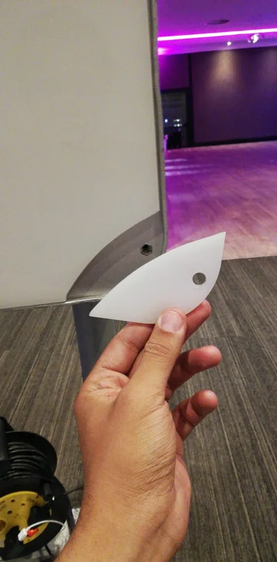 A broken piece from a photo booth casing.
